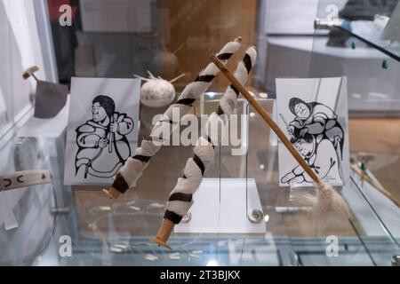 Canada, Nunavut, King William Island, Gjoa Haven. Nattlik Heritage Centre, interior. Traditional hair style display. Stock Photo