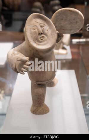 Canada, Nunavut, King William Island, Gjoa Haven. Nattlik Heritage Centre, interior. Traditional whale bone carving, circa 1970. Stock Photo