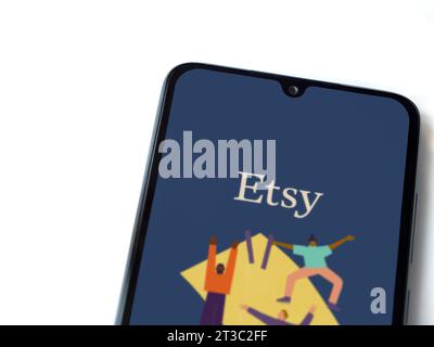 Lod, Israel - July 16,2023: Etsy Seller app launch screen on smartphone on white background. Top view flat lay with copy space. Stock Photo