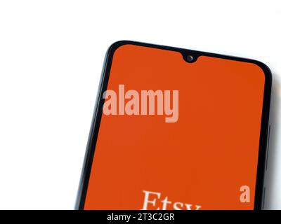 Lod, Israel - July 16,2023: Etsy app launch screen on smartphone on white background. Top view flat lay with copy space. Stock Photo