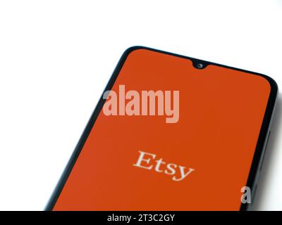 Lod, Israel - July 16,2023: Etsy app launch screen on smartphone on white background. Top view flat lay with copy space. Stock Photo