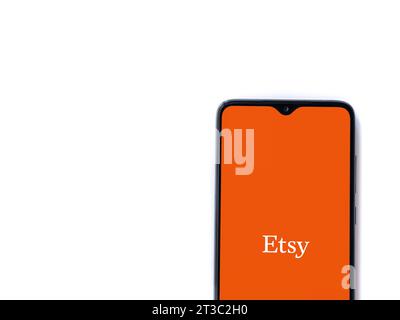 Lod, Israel - July 16,2023: Etsy app launch screen on smartphone on white background. Top view flat lay with copy space. Stock Photo