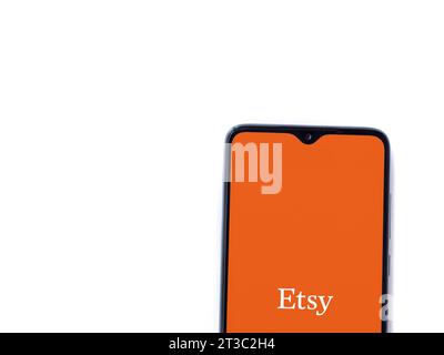 Lod, Israel - July 16,2023: Etsy app launch screen on smartphone on white background. Top view flat lay with copy space. Stock Photo