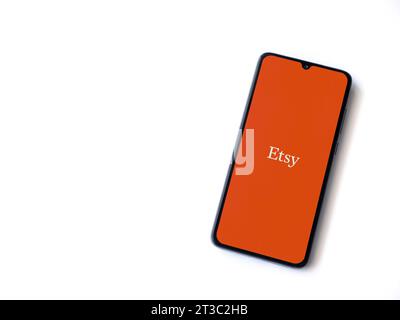 Lod, Israel - July 16,2023: Etsy app launch screen on smartphone on white background. Top view flat lay with copy space. Stock Photo
