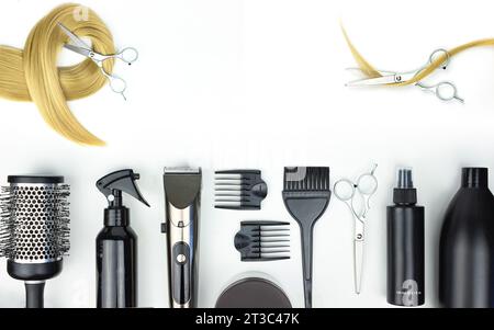 Set of hairdresser's tools on white background, hairdresser tools on white background top view. Barber tools, shears, clipper, razor, comb on a terry Stock Photo