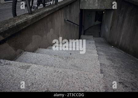Staircase  of an underground passage in a residential area of an italian town at sunset Stock Photo