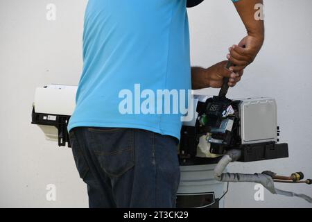 Maintenance, cleaning, and repair service for air conditioning systems Stock Photo