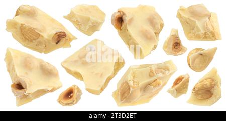 Broken white chocolate bar with hazelnuts isolated on white background Stock Photo