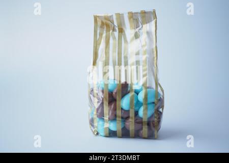 chocolates in a plastic packet on white background  Stock Photo