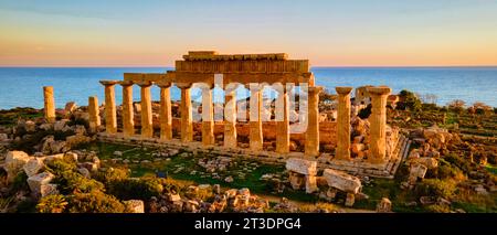 Greek temples at Selinunte, View of the sea, and ruins of Greek columns in Selinunte Archaeological Park Sicily Italy Stock Photo