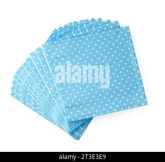 Stack of blue dotted paper napkins isolated on white Stock Photo