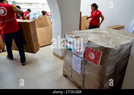 October 24, 2023: Tunis, Tunisia. 24 October 2023. Cardboard boxes are filled with supplies of humanitarian aid for Gaza at the headquarters of the Tunisian Red Crescent in Tunis. The humanitarian situation has drastically deteriorated in Gaza since Israeli forces began bombarding the Palestinian enclave after Hamas operation in Israel on October 7th (Credit Image: © Hasan Mrad/IMAGESLIVE via ZUMA Press Wire) EDITORIAL USAGE ONLY! Not for Commercial USAGE! Stock Photo