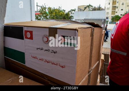 October 24, 2023: Tunis, Tunisia. 24 October 2023. Cardboard boxes are filled with supplies of humanitarian aid for Gaza at the headquarters of the Tunisian Red Crescent in Tunis. The humanitarian situation has drastically deteriorated in Gaza since Israeli forces began bombarding the Palestinian enclave after Hamas operation in Israel on October 7th (Credit Image: © Hasan Mrad/IMAGESLIVE via ZUMA Press Wire) EDITORIAL USAGE ONLY! Not for Commercial USAGE! Stock Photo