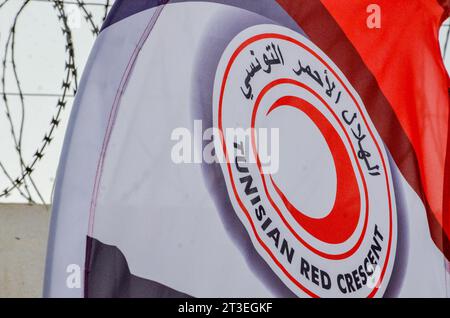 October 24, 2023: Tunis, Tunisia. 24 October 2023. The logo of the Tunisian Red Crescent. Supplies of humanitarian aid for Gaza are being prepared by the organisation in its headquarters in Tunis. The humanitarian situation has constantly deteriorated in Gaza since Israeli forces began bombarding the Palestinian enclave after Hamas operation in Israel on October 7th (Credit Image: © Hasan Mrad/IMAGESLIVE via ZUMA Press Wire) EDITORIAL USAGE ONLY! Not for Commercial USAGE! Stock Photo