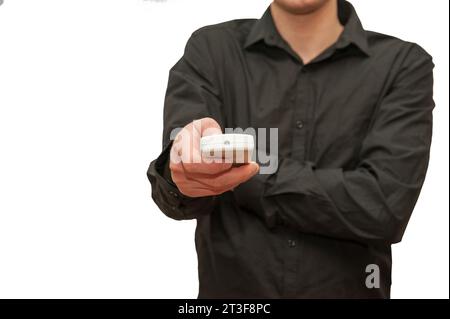 Man hands in a suit with wristwatches gets money from her purse full of dollars and cards isolated on white background Stock Photo