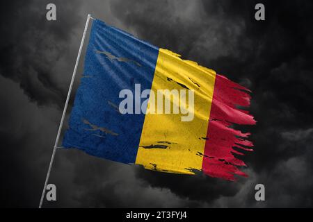 Chad torn flag on dark sky background with blood stains Stock Photo - Alamy