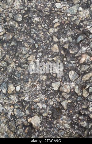 rough weathered outdoor concrete surface, natural aging exposed to rain, sun, wind, and other environmental factors, required maintenance to protect Stock Photo