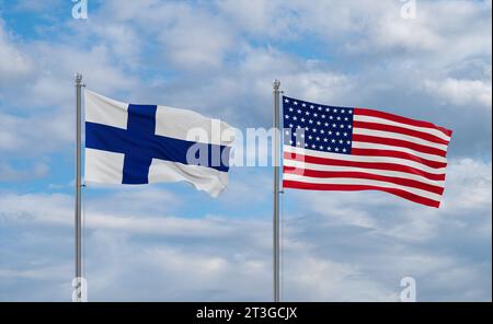 USA and Finland flags waving together in the wind on blue cloudy sky, two country relationship concept Stock Photo