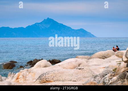 Greece, Chalkidiki, Sithonia, Sarti, Kavourotrypes Beach (Orange Beach Bar) and Mount Athos in the background Stock Photo