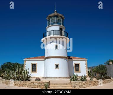 Gavdos Lighthouse, Crete island summer destination Greece. Architectural beacon monument operates nowadays as museum and cafe. Stock Photo