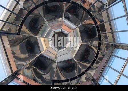 Interior top of Gavdos Lighthouse, Crete island Greece. Under view from ladder end of metal reflective frame construction with symmetrical design. Stock Photo