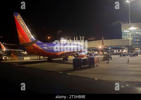 Denver, Colorado - Southwest Airlines jets on the ground at night at Denver International Airport. Stock Photo