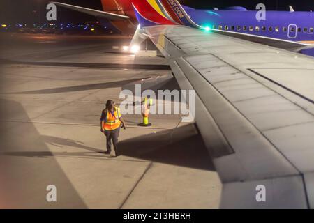 Denver, Colorado - Southwest Airlines jets on the ground at night at Denver International Airport. Stock Photo