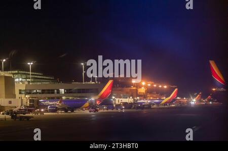 Denver, Colorado - Southwest Airlines jets on the ground at night at Denver International Airport. Stock Photo