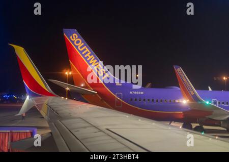 Denver, Colorado - Southwest Airlines jets on the ground at night at Denver International Airport. Stock Photo