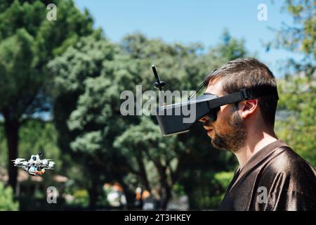 boy driving a drone with glasses Stock Photo
