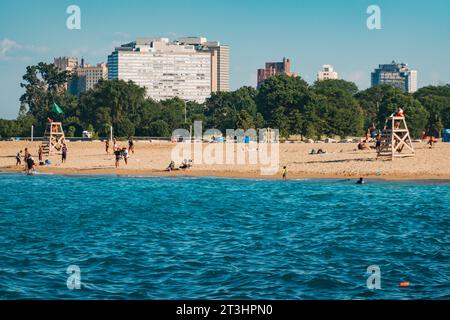 locals take a dip on a summer's day at Oakwood Beach on Lake Michigan, Chicago, United States Stock Photo