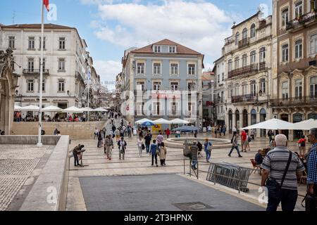 Praça 8 de Maio square leading to the main pedestrian street, Rua Ferreira Borges, in Coimbra, Portugal on 13 October 2023 Stock Photo