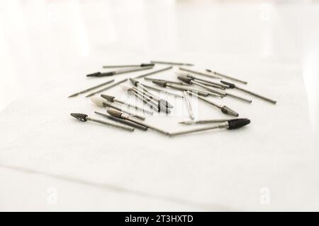 Podologist's medical instruments. Mill for processing the nail plate. Stock Photo