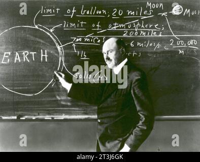 Dr. Robert Goddard at Clark University, Dr. Robert H. Goddard at a blackboard at Clark University in Worcester, Massachusetts, in 1924. Dr. Robert Hutchings Goddard (1882-1945). Dr. Goddard has been recognized as the father of American rocketry and as one of the pioneers in the theoretical exploration of space. Stock Photo