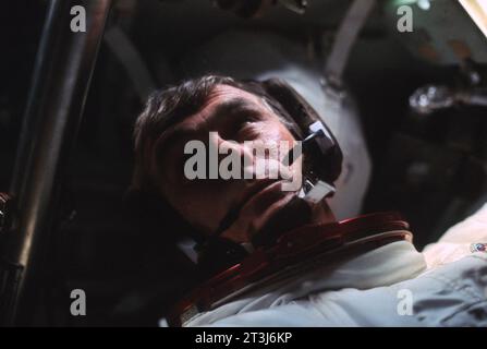 Eugene A. Cernan inside the Apollo 17 Command Module  Astronaut Eugene A. Cernan appears in this candid photograph taken by a fellow crewman aboard the Apollo 17 spacecraft near the end of their first day in space. Also, aboard Apollo 17 were astronaut Ronald E. Evans, command module pilot, and scientist-astronaut Harrison H. 'Jack' Schmitt, lunar module pilot. Cernan was the mission commander.   Image Number: AS17-162-24035 Date: December 7, 1972 Stock Photo