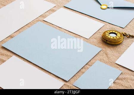 Composition colored papers vintage clocks Stock Photo