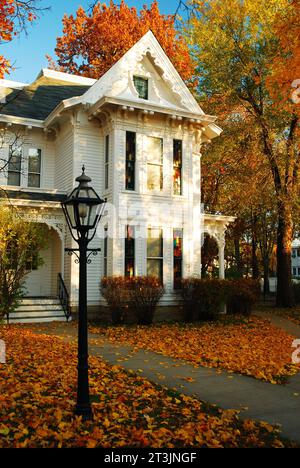 Fall leaves and autumn color frame the historic President Harry S Truman house in Independence Missouri, outside Kansas City Stock Photo