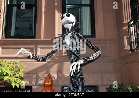 Jack Skellington from the 1993 film The Nightmare Before Christmas stands amongst pumpkins and cobwebs on a staircase of a decorated townhouse in New York, New York, Thursday, Oct. 19, 2023. (Photo: Gordon Donovan) Stock Photo