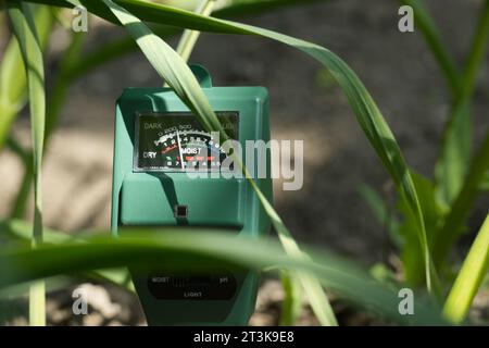 Three way meter to measure the soil pH, light and moisture level ...