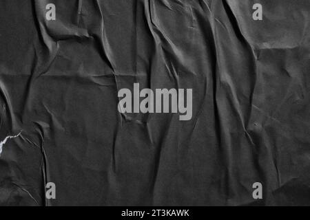 Glued black paper poster texture background Stock Photo