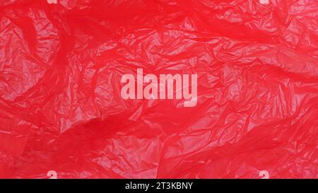 wrinkled red plastic bag texture Stock Photo