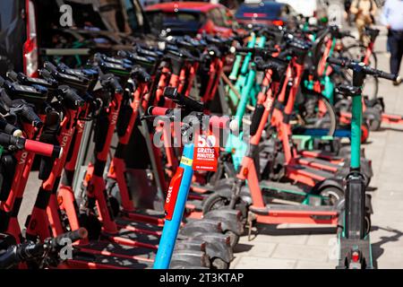 Stockholm, Sweden - May 23, 2023: lots of electric scooters parked in the city center Stock Photo