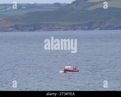 A small pedestrian ferry takes people from St Mawes on Roseland Peninsula across the water to Falmouth Cornwall England Stock Photo
