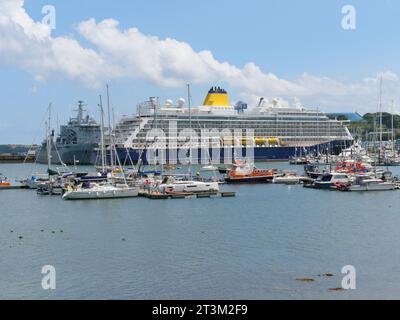 A white blue cruise ship lies in the harbor of Falmouth England Stock Photo