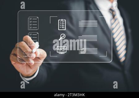 Digital entrepreneur signs electronic documents online on a black background Stock Photo