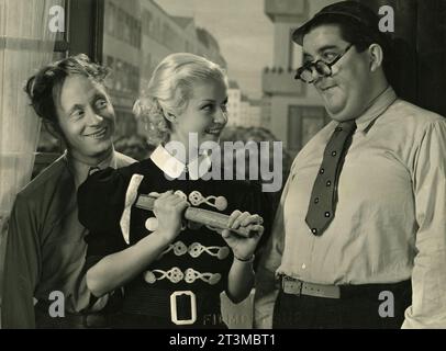 Danish actors Arthur Jensen, Ib Schønberg, and actress Carola Merrild in the movie Snushanerne, Denmark 1942 Stock Photo