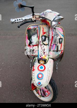 A Mod scooter parked up on the seafront at Brighton Stock Photo