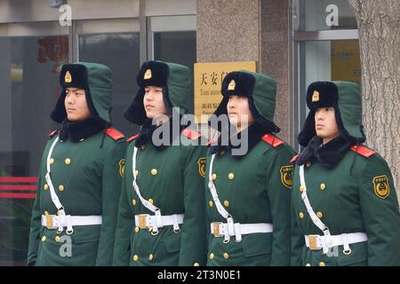 A Squad Of Young PLA Soldiers Stand To Attention Off Tiananmen Square. Beijing, China. Stock Photo