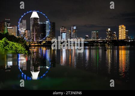 Nightskyline of Singapor with relfection Stock Photo