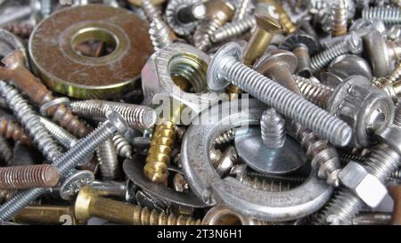 hardware metal background with screws nuts bolts Stock Photo